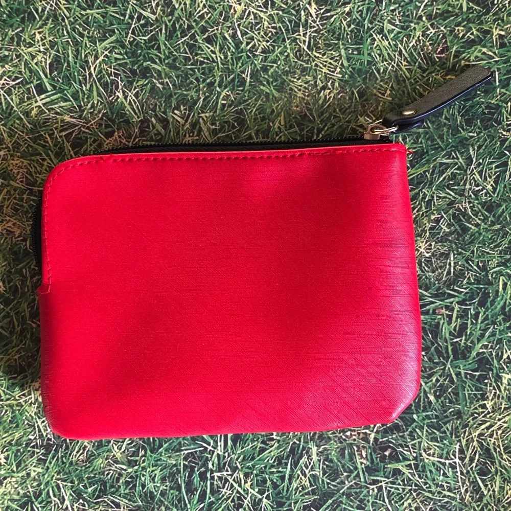 Shiseido Ginza Tokyo Red Makeup Bag with .33 oz Ultimune Deluxe Sample Included